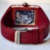 supple red fluoroelastomer strap with a richard mille titanium buckle