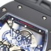 skeletonized dial with grade 5 titanium baseplate and double mainspring barrels