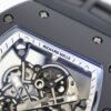 skeletonized dial with grade 5 titanium baseplate and double mainspring barrels