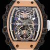 carbon fiber and 5n red gold, skeletonized dial, blue and gold Arabic numerals.