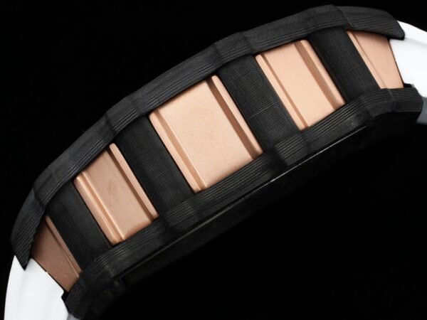 rm21 the watch case combines carbon tpt with 5n red gold.