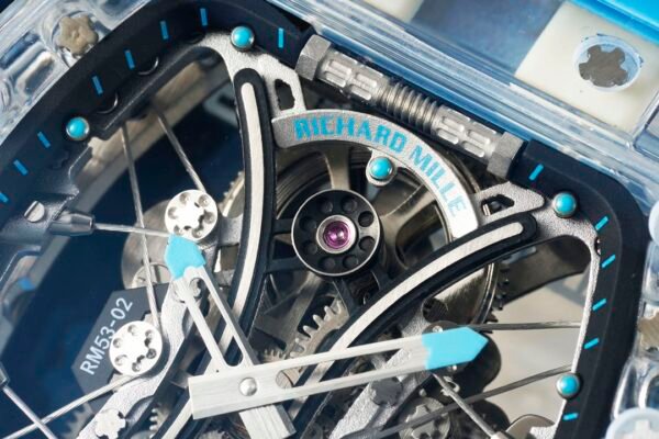 sapphire crystal case, cable-suspended movement, and clearly visible mainspring barrel.