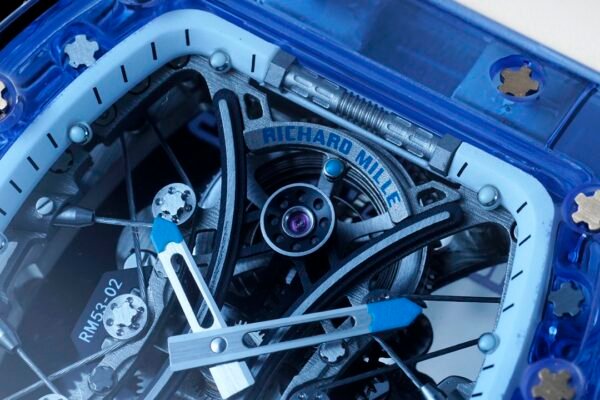 sapphire crystal case, cable-suspended movement, and clearly visible mainspring barrel. sapphire crystal case, cable-suspended movement, and clearly visible mainspring barrel.