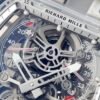 rm56-01 sapphire crystal case with a skeletonized dial clearly shows the mainspring barrel.