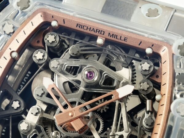 rm56-02 features a sapphire crystal case with a skeletonized dial and cable-suspension, clearly showing the mainspring barrel.
