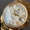 luxury men watch, daydate, 40mm, 18 gold, day and date display.