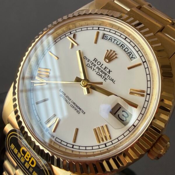 luxury men watch, daydate, 40mm, 18 gold, day and date display.